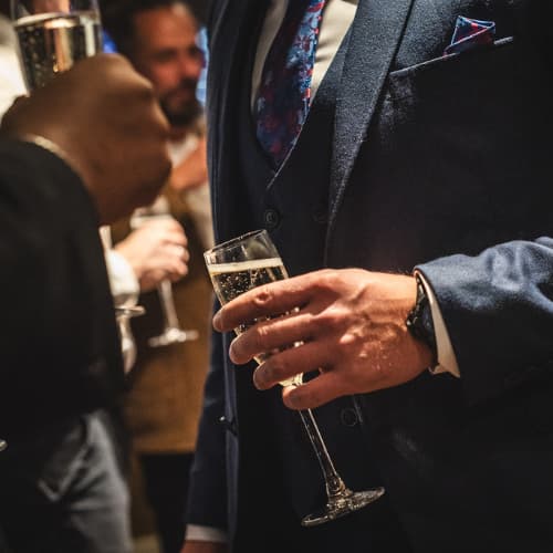 holding champagne glass holding champagne glass